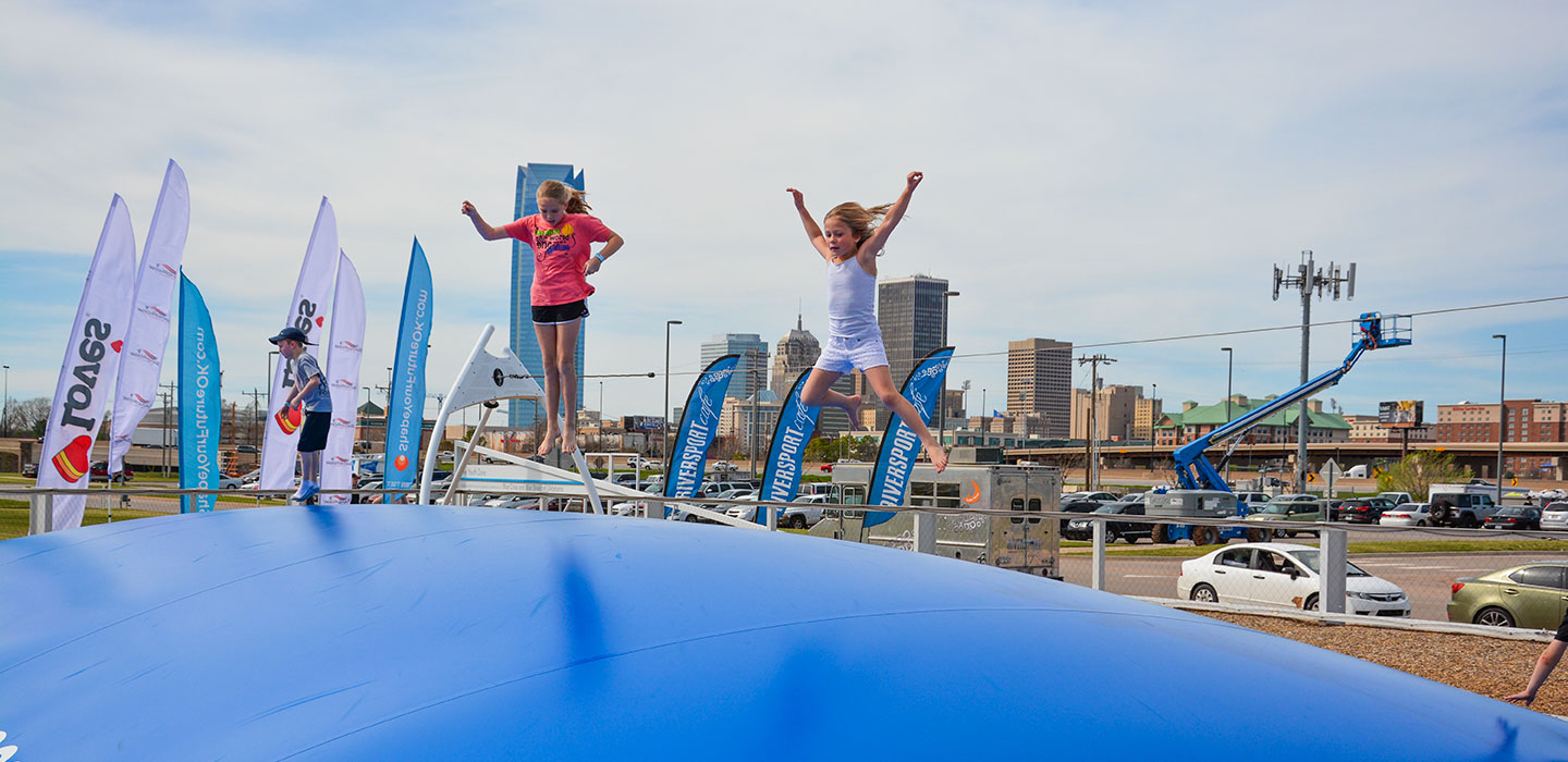 Image of Young Children Jumping on Cloud Bounce