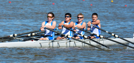 Image of four Junior Crew members rowing on the Oklahoma River