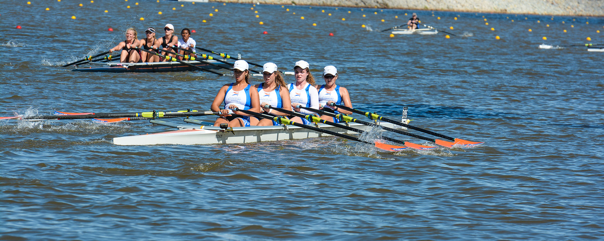 Image of Junior Crew rowing teams racing on the Oklahoma RIver